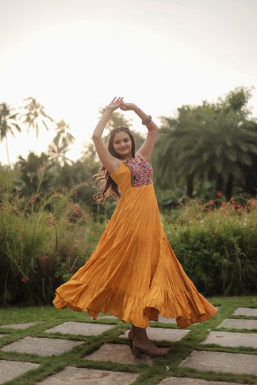 Menka : Yellow Gown made of Rayon Fabric with Kutchi Gamthi work